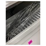 Tote full of stainless steel wire pegboard