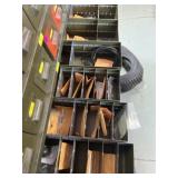 Drawer contents spacers, tensioners, bolts, fuel