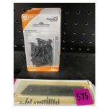 Four packs of wood screws and three packs of snap