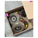 box of DEWALT flap discs and a wire cup brush
