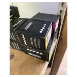 Seven boxes of black screws