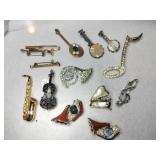Group of music instrument rhinestone brooches