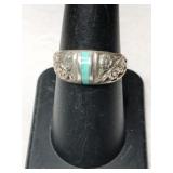 Silver  turquoise Ring size 7.    .125oz
