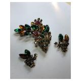 Goldtone multicolor rhinestone roach with clip-on