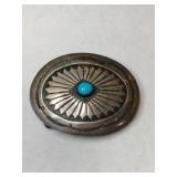 Silver small turquoise belt buckle.    .370oz