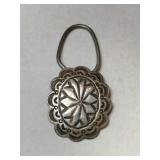 Silver Navajo flower keyring.   .405oz