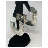 Silver Large hooped earrings w/ it's design