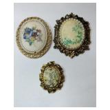 Gold tone sugar glass flowered brooches