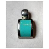 Silver native American turquoise pendant marked