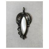 Silver  Navajo mother of pearl pendant .