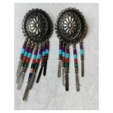 Silver hand crafted beaded dangle post earrings.