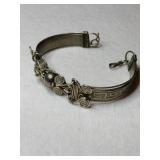 Silver wire wrapped hinge bangle bracelet