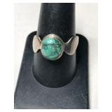 Silver turquoise Ring size 9.    .120oz