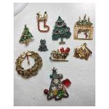 Nine Christmas brooches