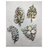 Gold tone White /clear rhinestone brooches