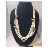 Multi-strands dentalium shells with elephant