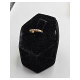 10k gold ring Size 0  .38 grams