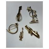 Gold tone shoe,  phone ,instruments brooches