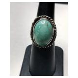 Silver Navajo turquoise ring size 5.     .280oz