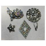 4 silver tone light blue/ clear rhinestone