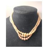 3 stand faux Pearl necklace and goldtone stand