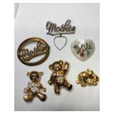Mother and bear brooches