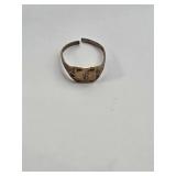 10k Gold ring size 0   .49  grams