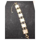 Goldtone square mother of pearl link bracelet