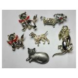 Gold and silver dog and cat brooches