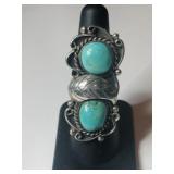 Silver Navajo turquoise ring size 6.      .375oz