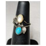 Silver Navajo turquoise Ring size 4.    .080oz