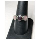 Silver multicolor stones Ring size 8.    .095oz