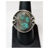 Silver turquoise Ring .    Size 7  .275oz