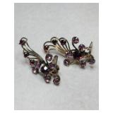 Vintage gold tone purple and red rhinestone clip