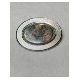 Silver round brooch  marked Sterling.  .215oz