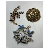 Gold and silver tone rhinestone brooches