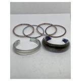 Glass cuff and bangle bracelets