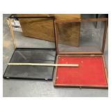 2 24'x18'display cases, one wooden, black has
