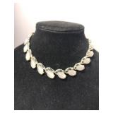 Silver tone white thermoset leaf link choker