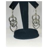 Silver heart dangled earrings unmarked.    .225