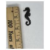 Miniature metal seahorse figurine