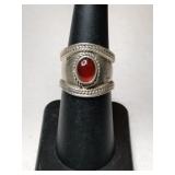 Silver red stone Ring marked 925.    Size 6