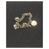 Rhythm Sterling Charm Bracelet marked Sterling