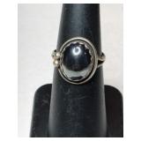 Silver  ring. Marked Sterling signed Size 5.