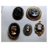 Black backs cameo brooches