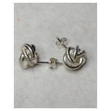 Silve knot post earrings marked 925.    .115oz