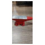 Tiny red 4in x2in anvil