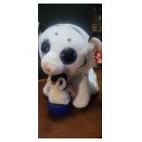 A large ty beanie and small penguin ty beanie