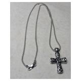 Silver cross necklace marked 925.    .190oz