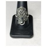 Silver flower ring marked Sterling size 9.